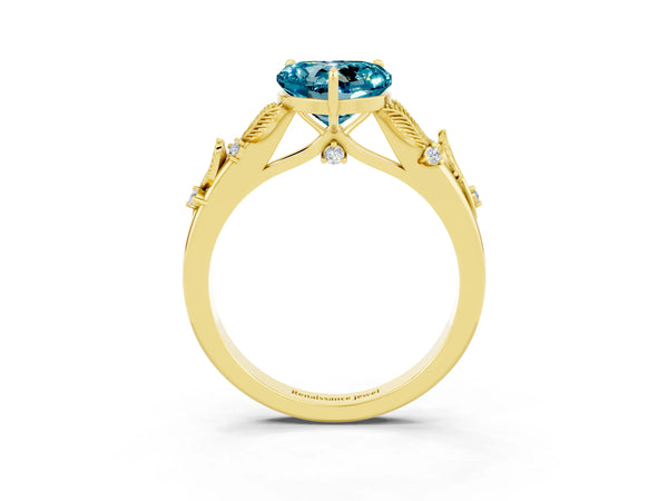 Yellow gold Heart Cut Blue Topaz Solitaire Ring with Leaf Motif Band and Four-Prong Setting