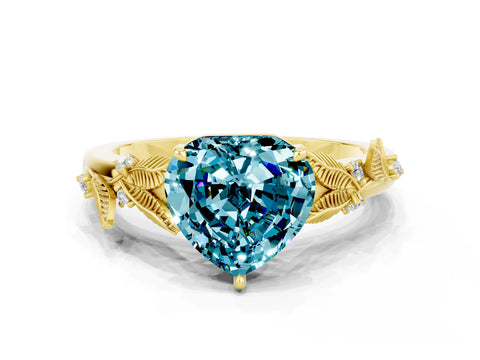 Yellow gold Heart Cut Blue Topaz Solitaire Ring with Leaf Motif Band and Four-Prong Setting