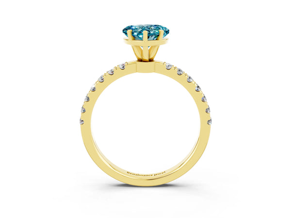 Yellow gold Heart Cut Blue Topaz Solitaire Ring with Pavé Accents and Four-Prong Setting
