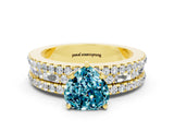 Yellow gold Heart Cut Blue Topaz Solitaire Ring with Pavé and Channel Set Band