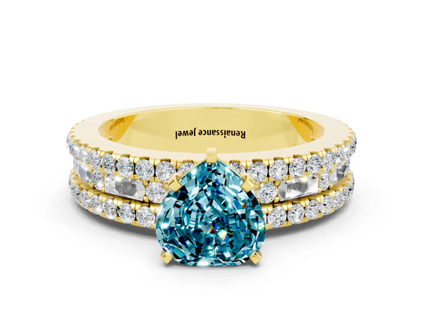 Yellow gold Heart Cut Blue Topaz Solitaire Ring with Pavé and Channel Set Band