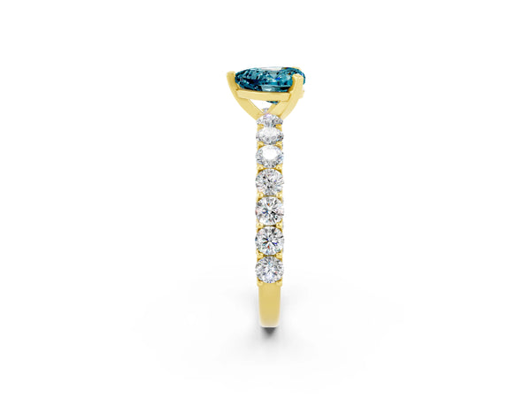 Yellow gold Heart Cut Blue Topaz Solitaire Ring with Shared Prong Pavé Band and Four-Prong Setting