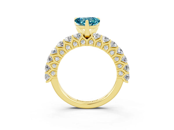 Yellow gold Heart Cut Blue Topaz Solitaire Ring with Shared Prong Pavé Band and Four-Prong Setting