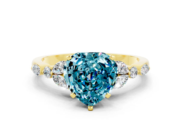 Yellow gold Heart Cut Blue Topaz Solitaire Ring with Side Stones and Four-Prong Setting
