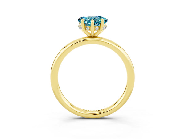 Yellow gold Heart Cut Blue Topaz Solitaire Ring with Thin Band and Four-Prong Setting