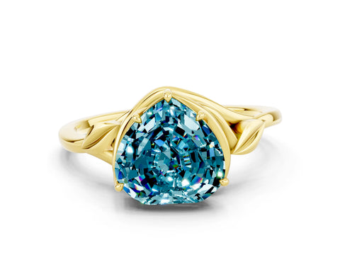 Yellow gold Heart Cut Blue Topaz Solitaire Ring with Twist Band and Four-Prong Setting_24