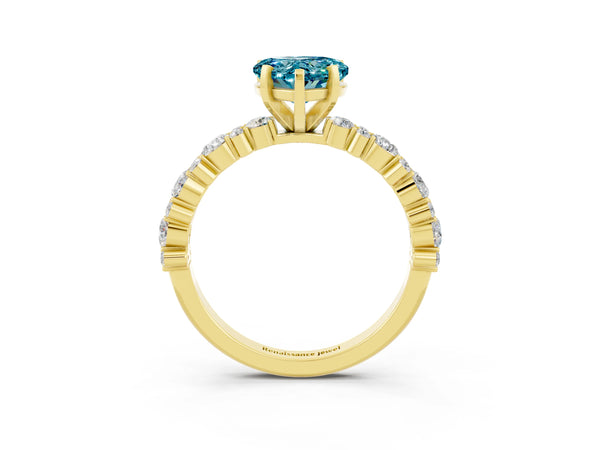 Yellow gold Heart Cut Blue Topaz Side Stone Solitaire Ring with Round  and Four-Prong Setting