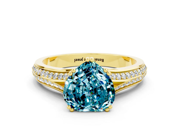 Yellow gold Heart Cut Blue Topaz Split Shank Engagement Ring with Pavé Band