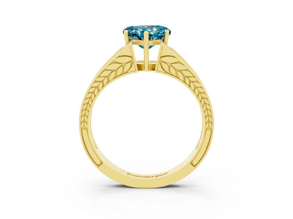 Yellow gold Heart Cut Blue Topaz Split Shank Ring with Pavé Band and Four-Prong Setting