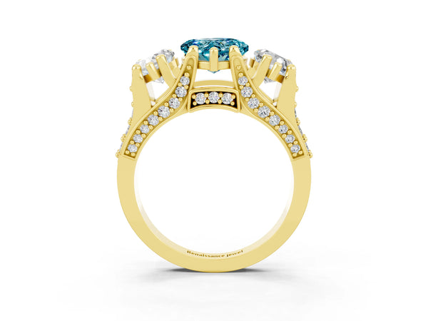 Yellow gold Heart Cut Blue Topaz Three-Stone Ring with Channel Set Band and Four-Prong Setting