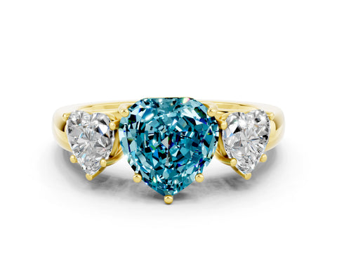 Yellow gold Heart Cut Blue Topaz Three-Stone Ring with Four-Prong Setting and Classic Band