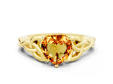 Yellow gold Heart Cut Citrine Solitaire Engagement Ring with Celtic Knot Band and Four-Prong Setting