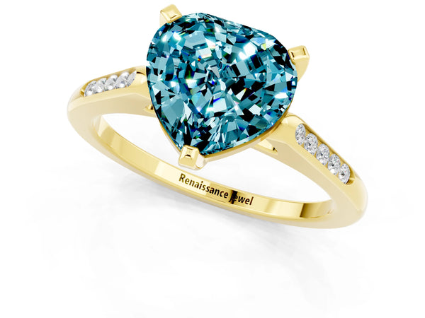 Yellow gold Heart Cut Blue Topaz Solitaire Ring with Channel Set Round  Band and Prong Setting