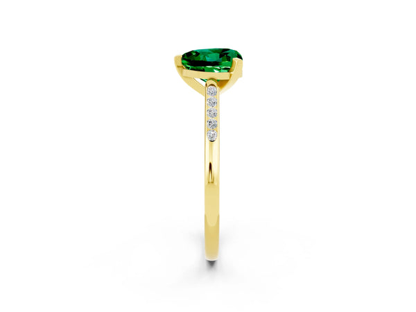 Yellow gold Heart Cut Emerald Solitaire Ring with Channel Set Round  Band and Prong Setting