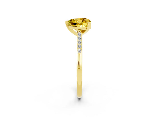 Yellow gold Heart Cut Yellow Sapphire Solitaire Ring with Channel Set Round  Band and Prong Setting