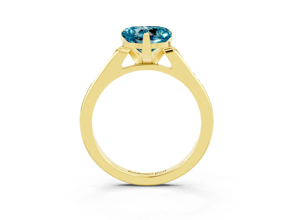 Yellow gold Heart Cut Blue Topaz Solitaire Ring with Channel Set Round  Band and Prong Setting