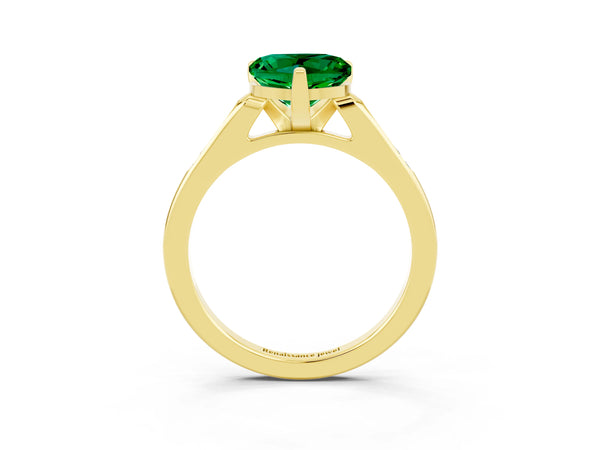 Yellow gold Heart Cut Emerald Solitaire Ring with Channel Set Round  Band and Prong Setting