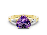 Yellow gold Heart Cut Cut Diamond Ring with Tapered Baguette Side Stones in Four-Prong Setting