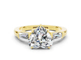 Yellow gold Heart Cut Cut Diamond Ring with Tapered Baguette Side Stones in Four-Prong Setting