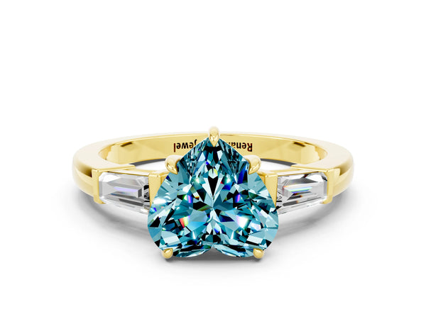Yellow gold Heart Cut Cut Diamond Ring with Tapered Baguette Side Stones in Four-Prong Setting