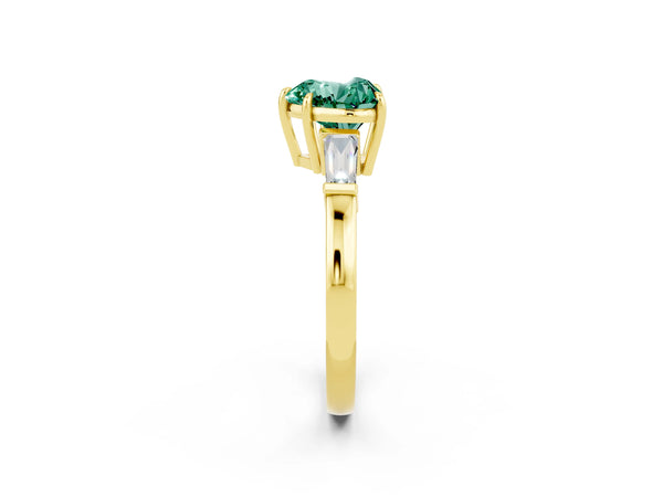 Yellow gold Heart Cut Green Sapphire Three-Stone Ring with Tapered Baguette Side Stones and Prong Setting