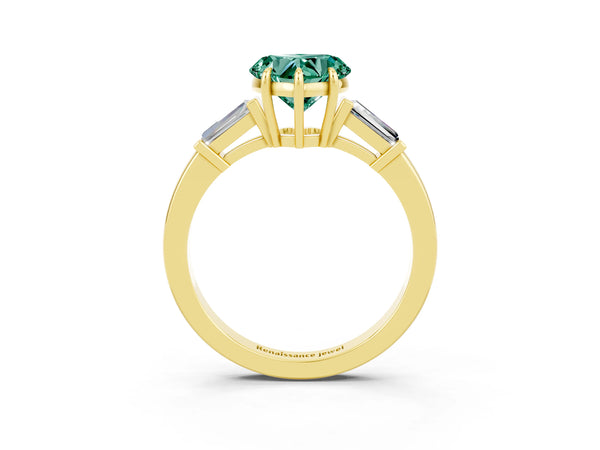 Yellow gold Heart Cut Green Sapphire Three-Stone Ring with Tapered Baguette Side Stones and Prong Setting