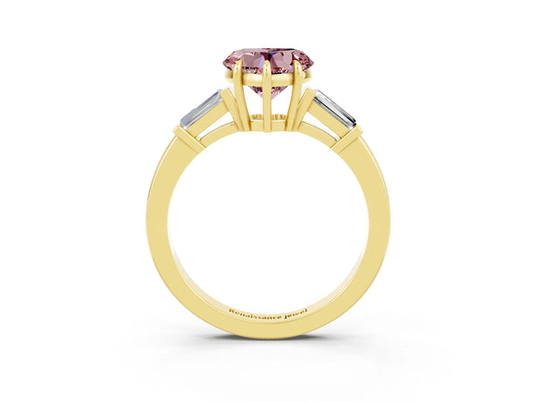 Yellow gold Heart Cut Cut Diamond Ring with Tapered Baguette Side Stones in Four-Prong Setting