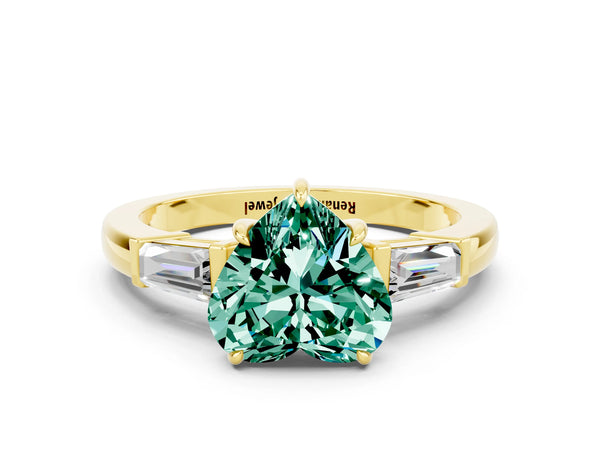 Yellow gold Heart Cut Green Sapphire Three-Stone Ring with Tapered Baguette Side Stones and Prong Setting