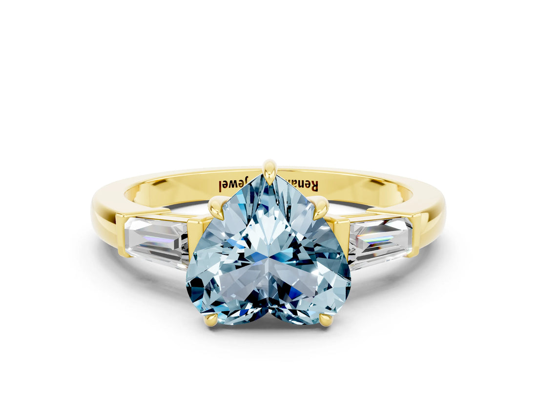Yellow gold Heart Cut Cut Diamond Ring with Tapered Baguette Side Stones in Four-Prong Setting