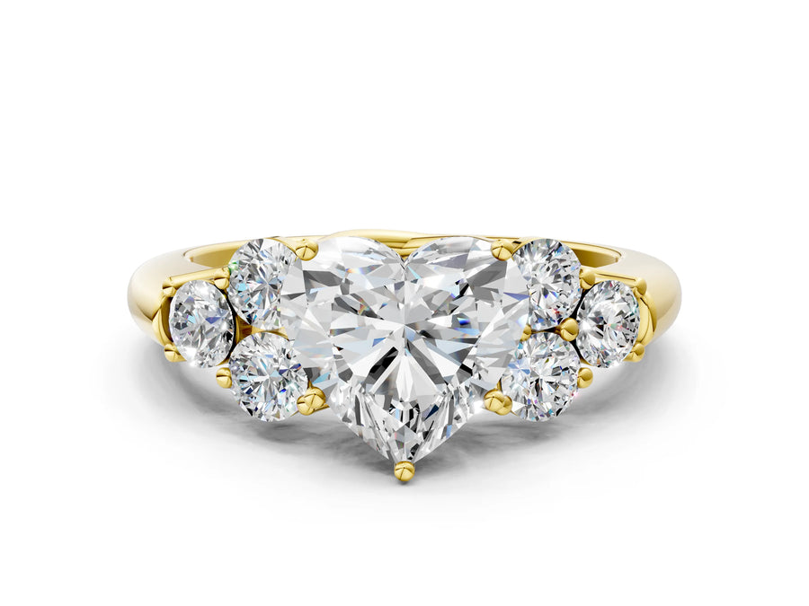 Yellow gold Heart Cut Diamond Cluster Ring with Round Accent Stones and Prong Setting on a Classic Band