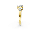 Yellow gold Heart Cut Diamond Cluster Ring with Round Accent Stones and Prong Setting on a Classic Band_63