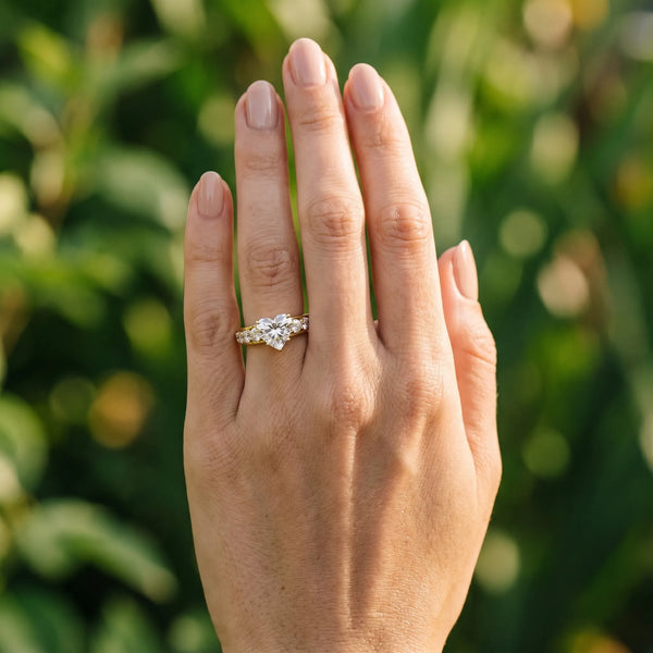 Yellow gold Heart Cut Diamond Engagement Ring with Pavé Band and Four-Prong Setting