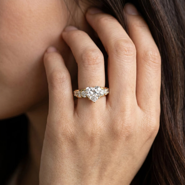 Yellow gold Heart Cut Diamond Engagement Ring with Pavé Band and Four-Prong Setting