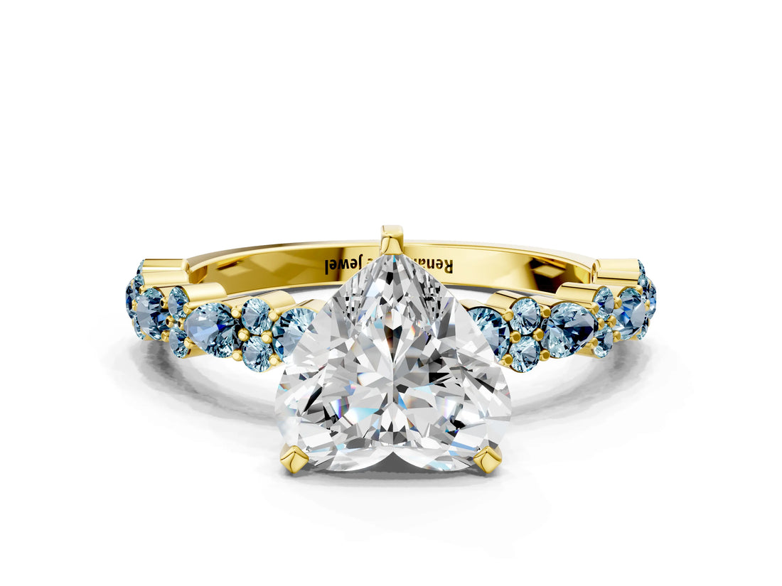 Yellow gold Heart Cut Diamond Side Stone Solitaire Ring with Round with Aquamarine side stone and Four-Prong Setting