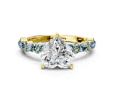 Yellow gold Heart Cut Diamond Side Stone Solitaire Ring with Round with Aquamarine side stone and Four-Prong Setting