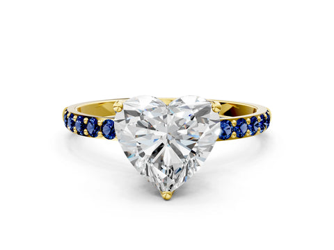 Yellow gold Heart Cut Diamond Solitaire Engagement Ring with Round with Blue Sapphire side stone Pavé Band and Prong Setting