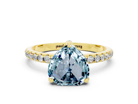 Yellow gold Heart Cut Diamond Solitaire Ring with Four-Prong Setting and Pavé Band