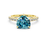Yellow gold Heart Cut Diamond Solitaire Ring with Four-Prong Setting and Pavé Band