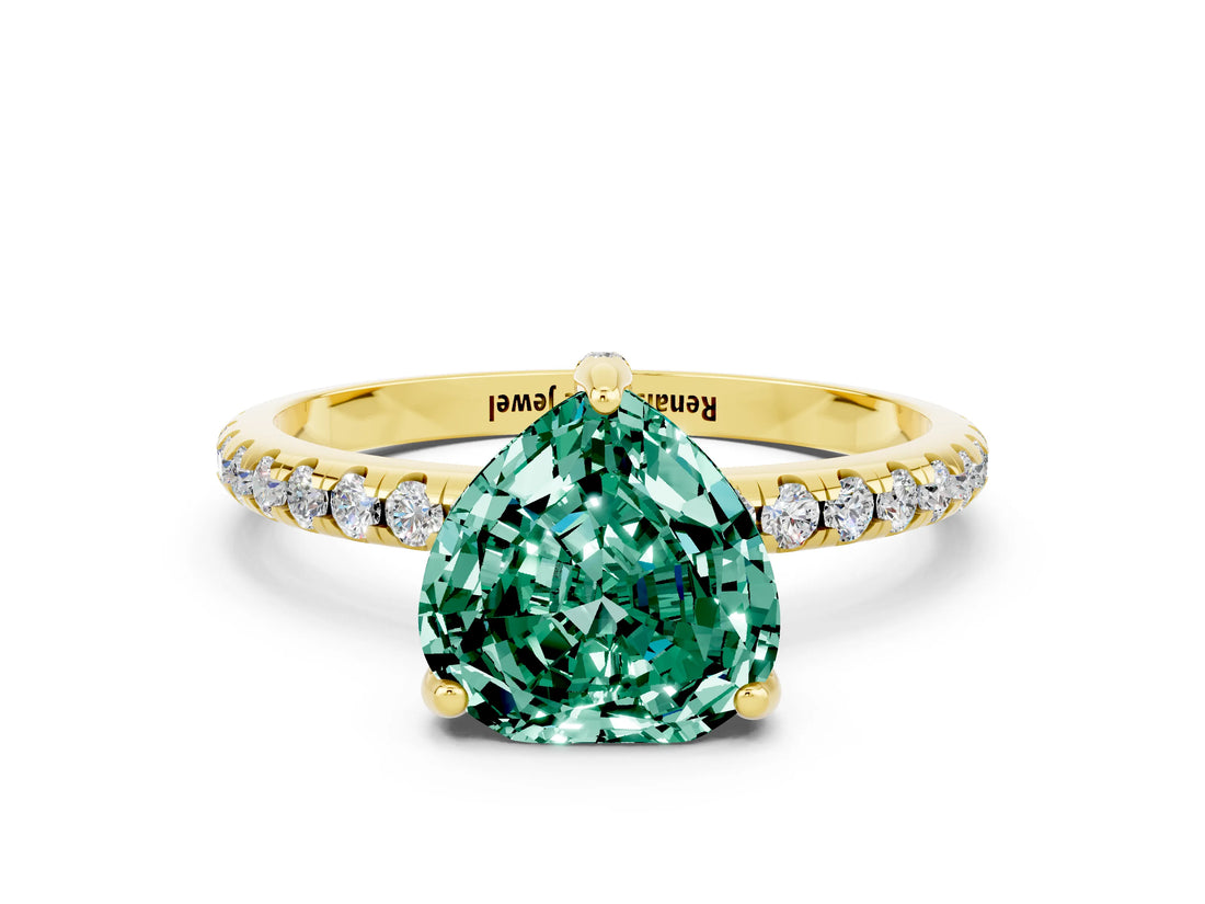 Yellow gold Heart Cut Diamond Solitaire Ring with Four-Prong Setting and Pavé Band