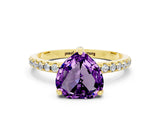 Yellow gold Heart Cut Diamond Solitaire Ring with Four-Prong Setting and Pavé Band