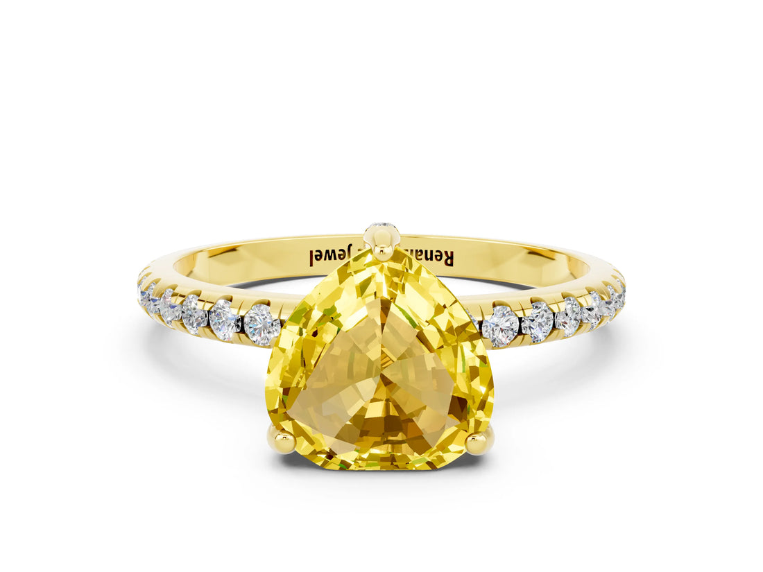 Yellow gold Heart Cut Diamond Solitaire Ring with Four-Prong Setting and Pavé Band