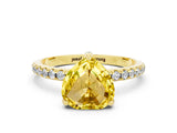 Yellow gold Heart Cut Diamond Solitaire Ring with Four-Prong Setting and Pavé Band