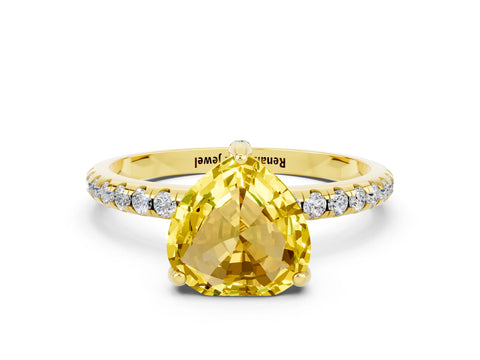 Yellow gold Heart Cut Diamond Solitaire Ring with Four-Prong Setting and Pavé Band