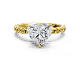 Yellow gold Heart Cut Diamond Solitaire Ring with Pavé Band and Four-Prong Setting