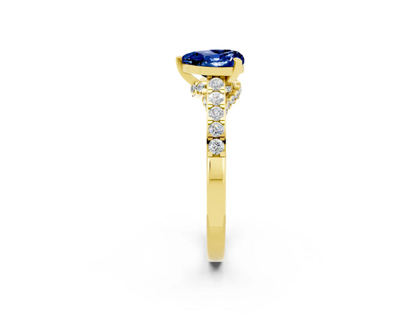 Yellow gold Heart Cut Blue Sapphire Solitaire Ring with Crossover Gallery and Round  Pavé Band