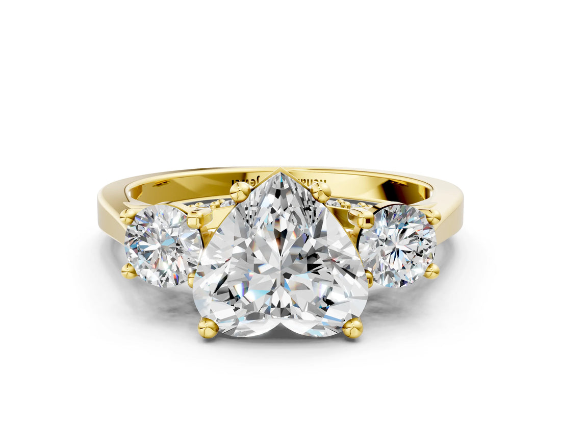 Yellow gold Heart Cut Diamond Three-Stone Engagement Ring with Prong Setting and Pavé Band_3