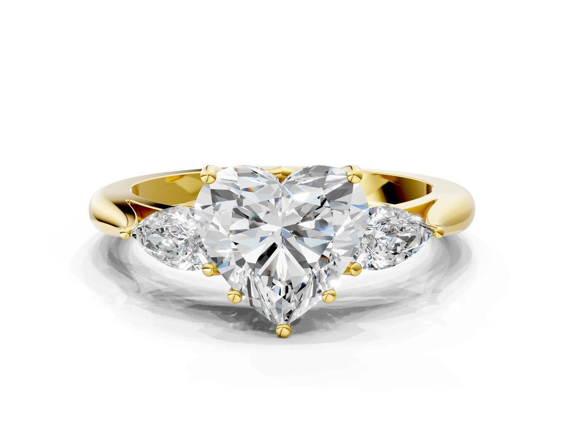 Yellow gold Heart Cut Diamond Three-Stone Ring with Pear Side Stones and Four-Prong Setting_113