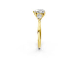 Yellow gold Heart Cut Diamond Three-Stone Ring with Pear Side Stones and Four-Prong Setting_115