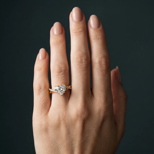Yellow gold Heart Cut Diamond Twisted Band with Pavé Setting and Four-Prong Setting