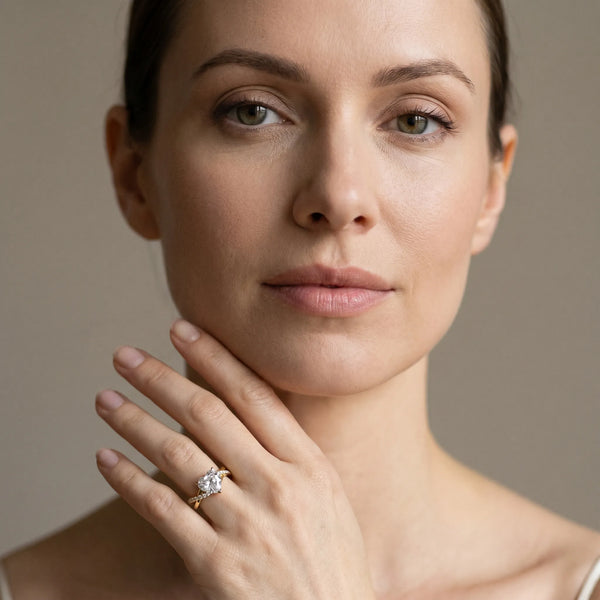 Yellow gold Heart Cut Diamond Twisted Band with Pavé Setting and Four-Prong Setting